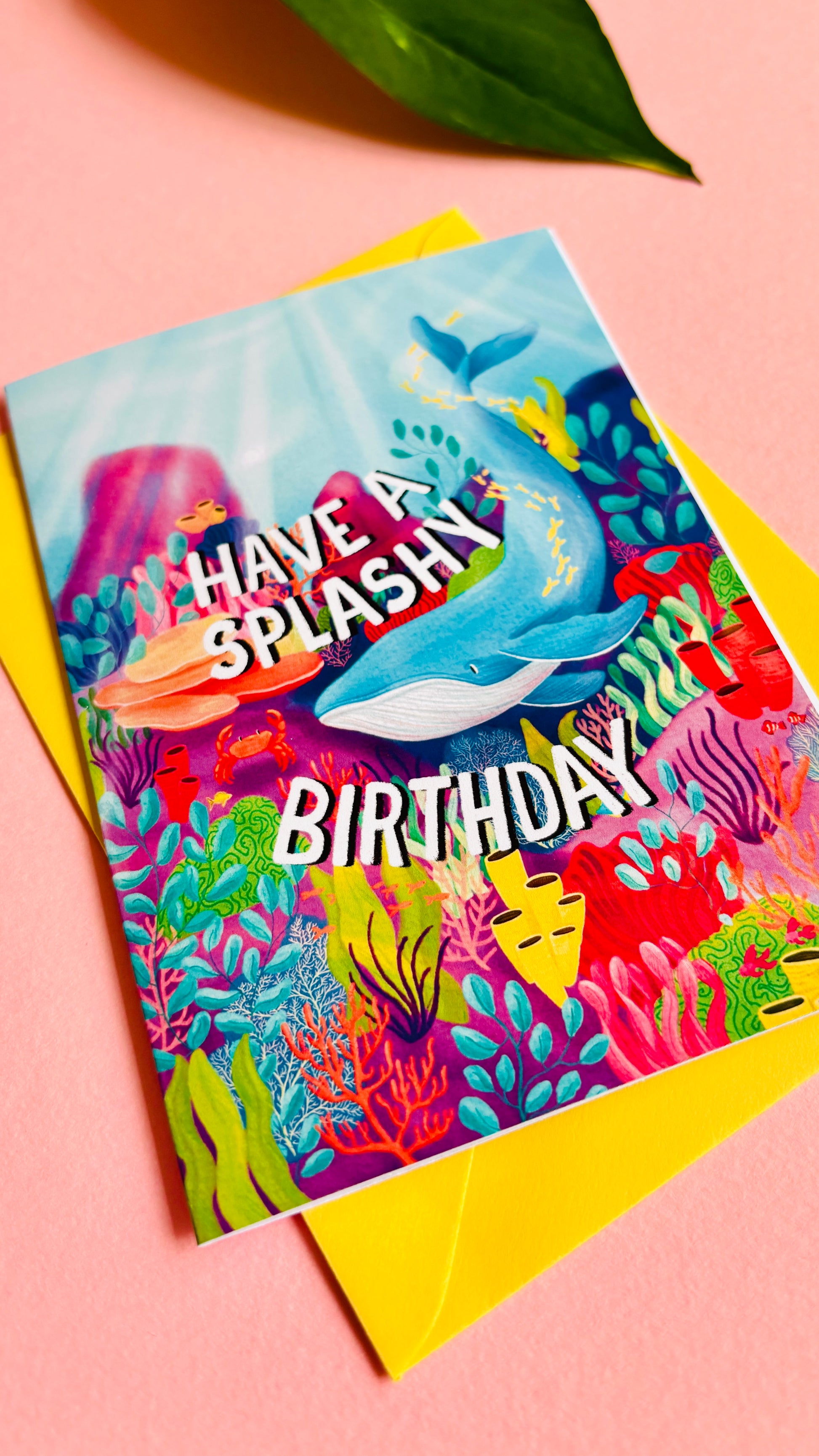 Whale handmade birthday card reads “have a splashy birthday” colourful coral reef and whale design. Handmade in the uk this card measures approximately a6, is blank inside for your message and is supplied with a cheerful yellow envelope