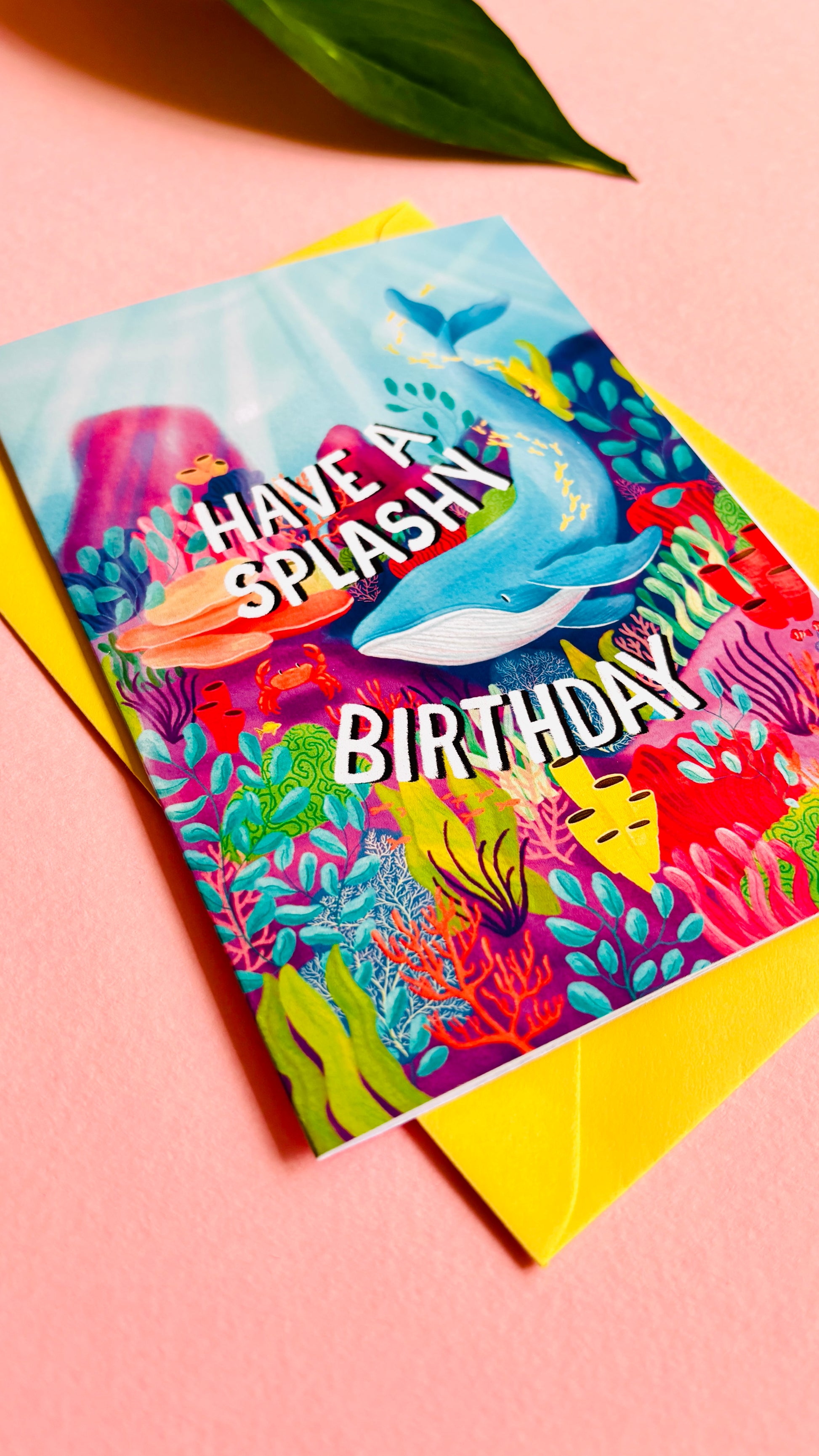 Whale handmade birthday card reads “have a splashy birthday” colourful coral reef and whale design. Handmade in the uk this card measures approximately a6, is blank inside for your message and is supplied with a cheerful yellow envelope