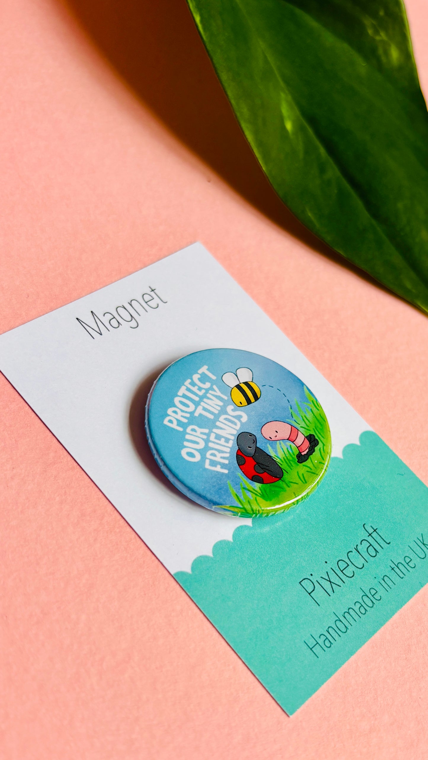 Eco-warrior gift for bug lovers, vegans, vegetarians and those who care about the planet! This cute handmade pin badge or fridge magnet reads ‘protect our tiny friends’ above a cute illustration of some friendly bugs; a ladybird, bee and worm’. Handmade in the UK and presented on a colourful backing card ready to gift. Ideal for stocking fillers.