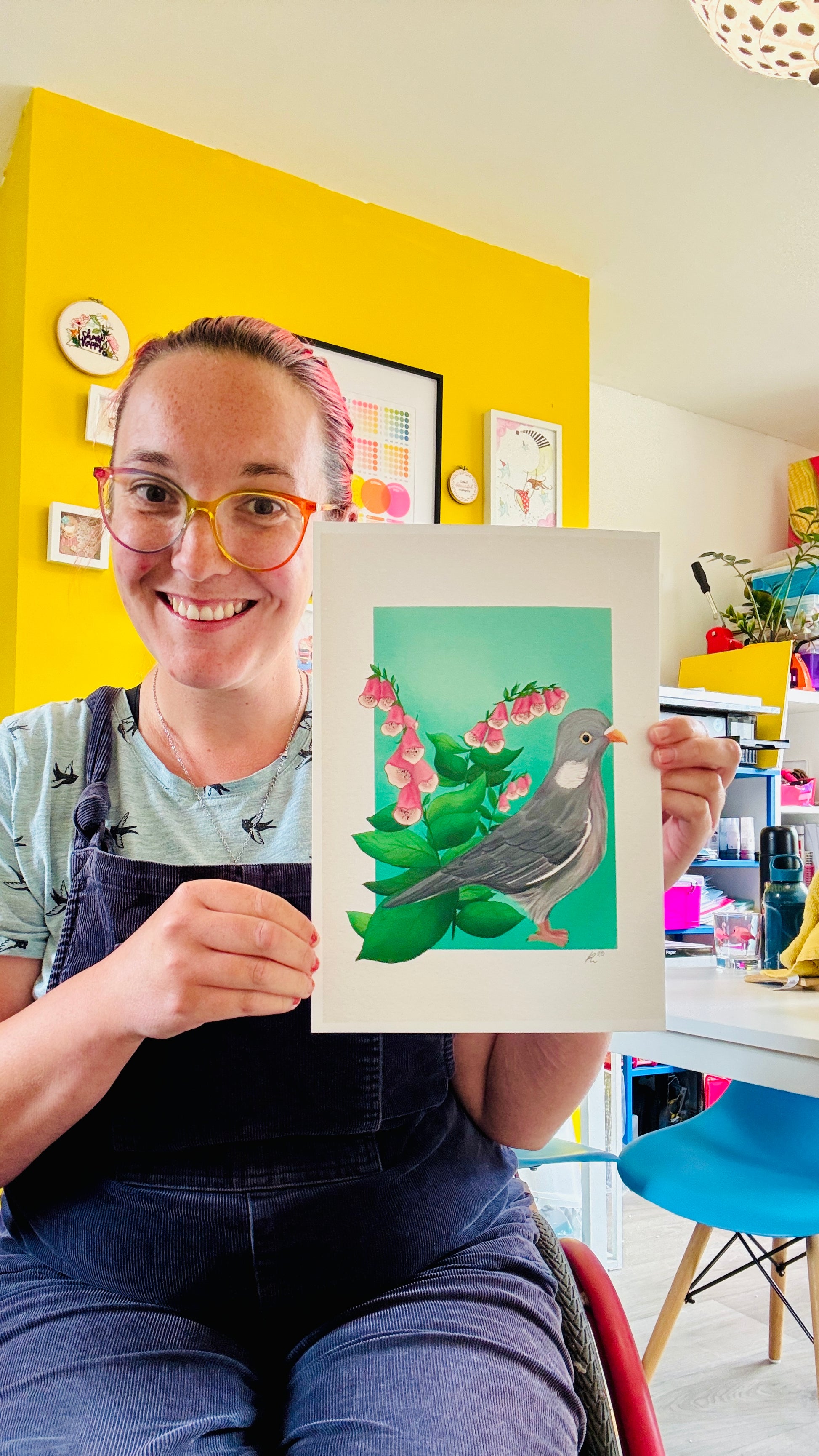 British wildlife pigeon art print for nature lovers. This cute print features an adorable wood pigeon in front of a bunch of pink foxglove plants. The perfect gift for nature lovers.