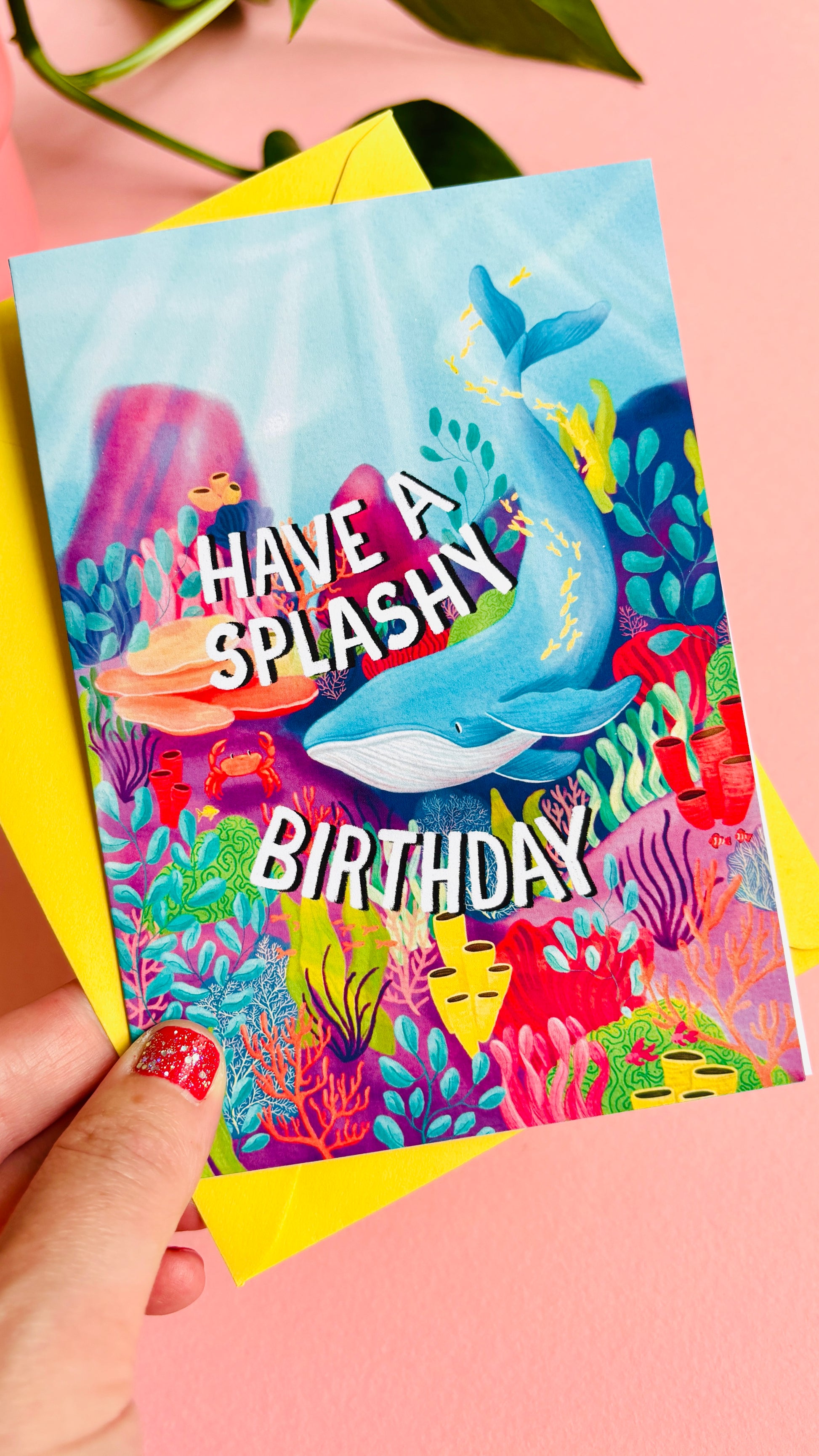 Whale handmade birthday card reads “have a splashy birthday” colourful coral reef and whale design. Handmade in the uk this card measures approximately a6, is blank inside for your message and is supplied with a cheerful yellow envelope