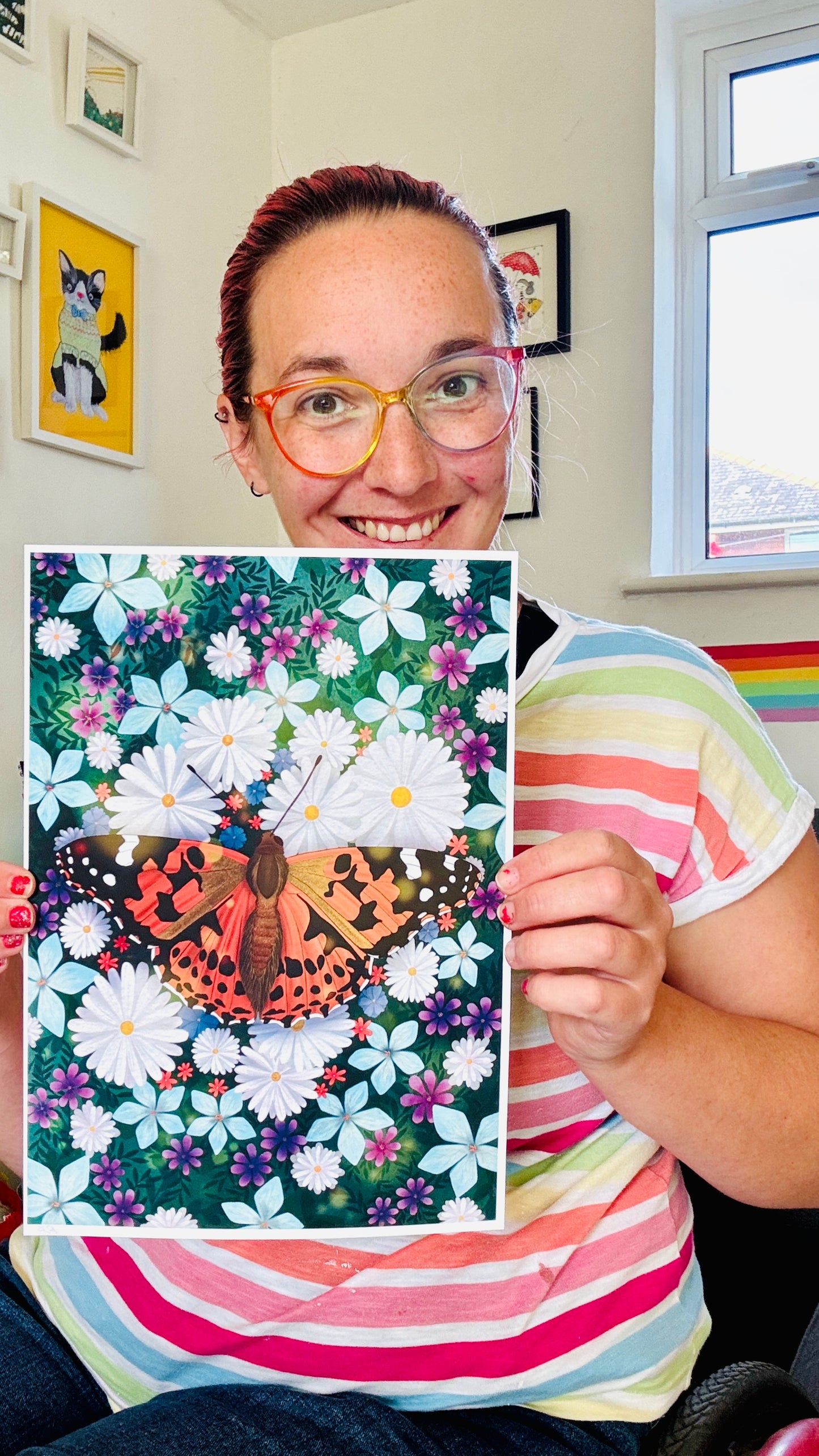 Colourful nature art print of a painted lady butterfly resting in a field of wildflowers. This beautiful illustration is perfect for lovers of nature, botanical illustration, wildflowers and cottagecore aesthetics. Illustrated and printed in the uk onto archival matte art paper and signed by the artist.