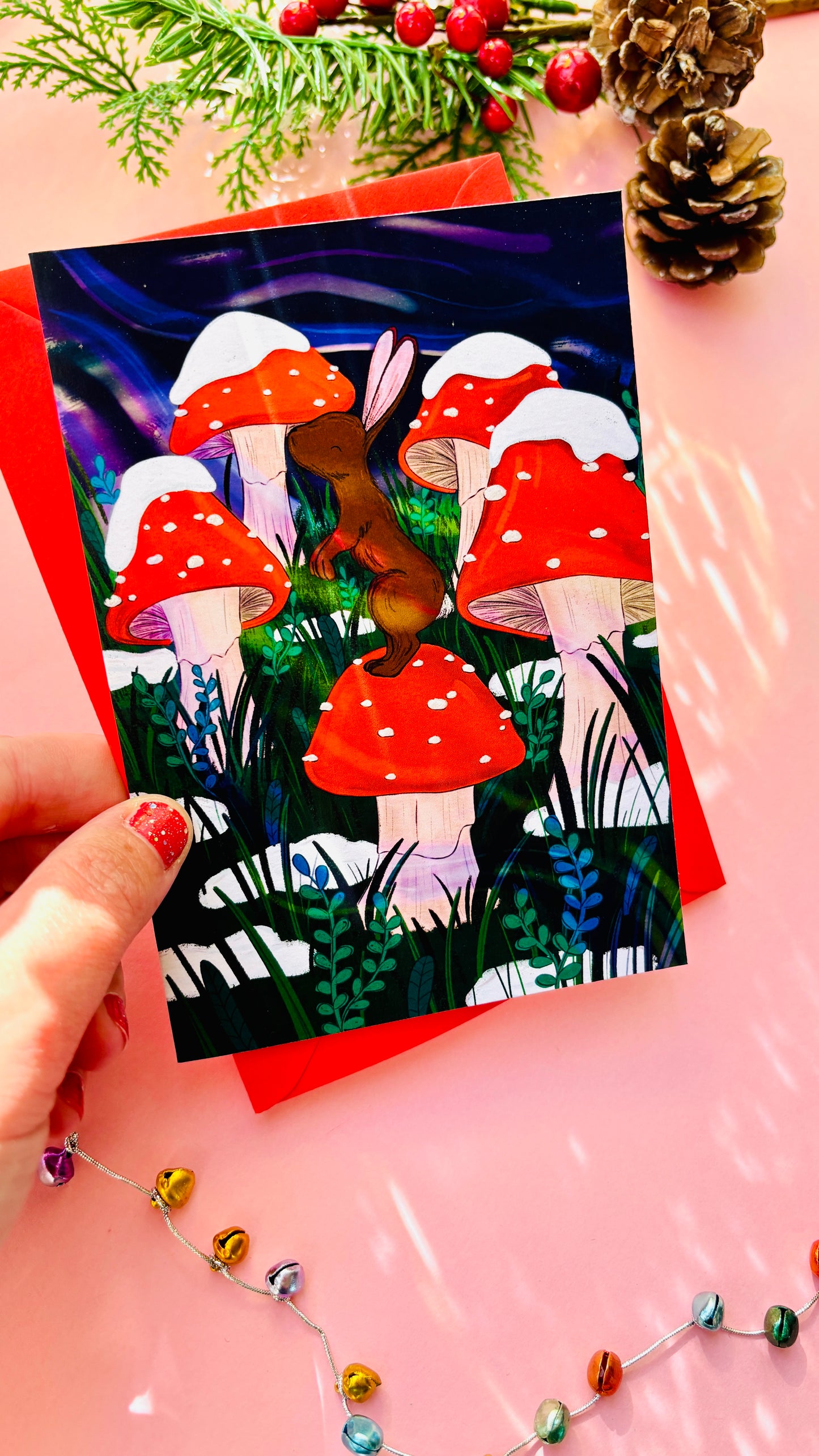 Whimsical woodland Christmas card with bunny and toadstool, eco-friendly festive greeting ideal for nature and forestcore lovers.