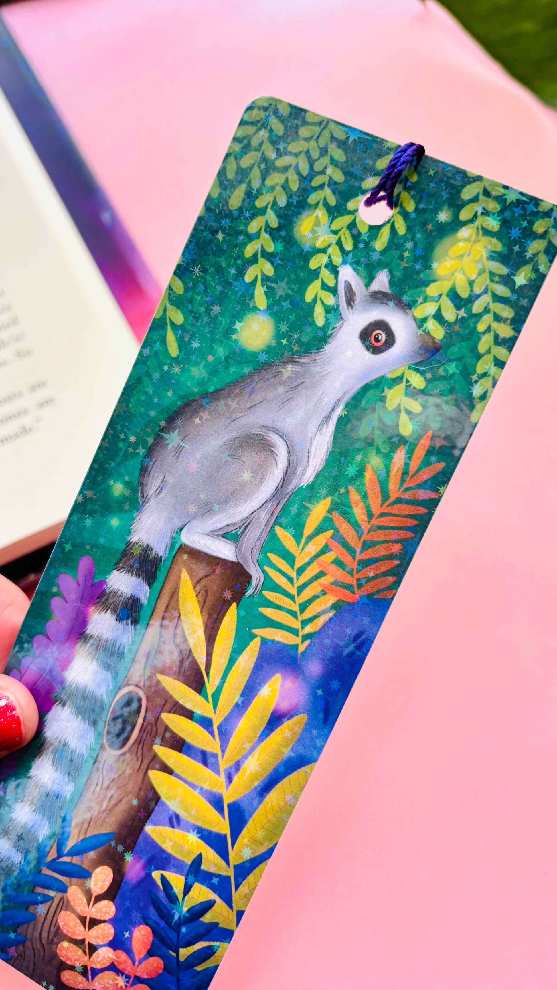 Whimsical rainforest lemur bookmark, rainbow holographic laminate, double-sided and handmade for readers and gift-giving.