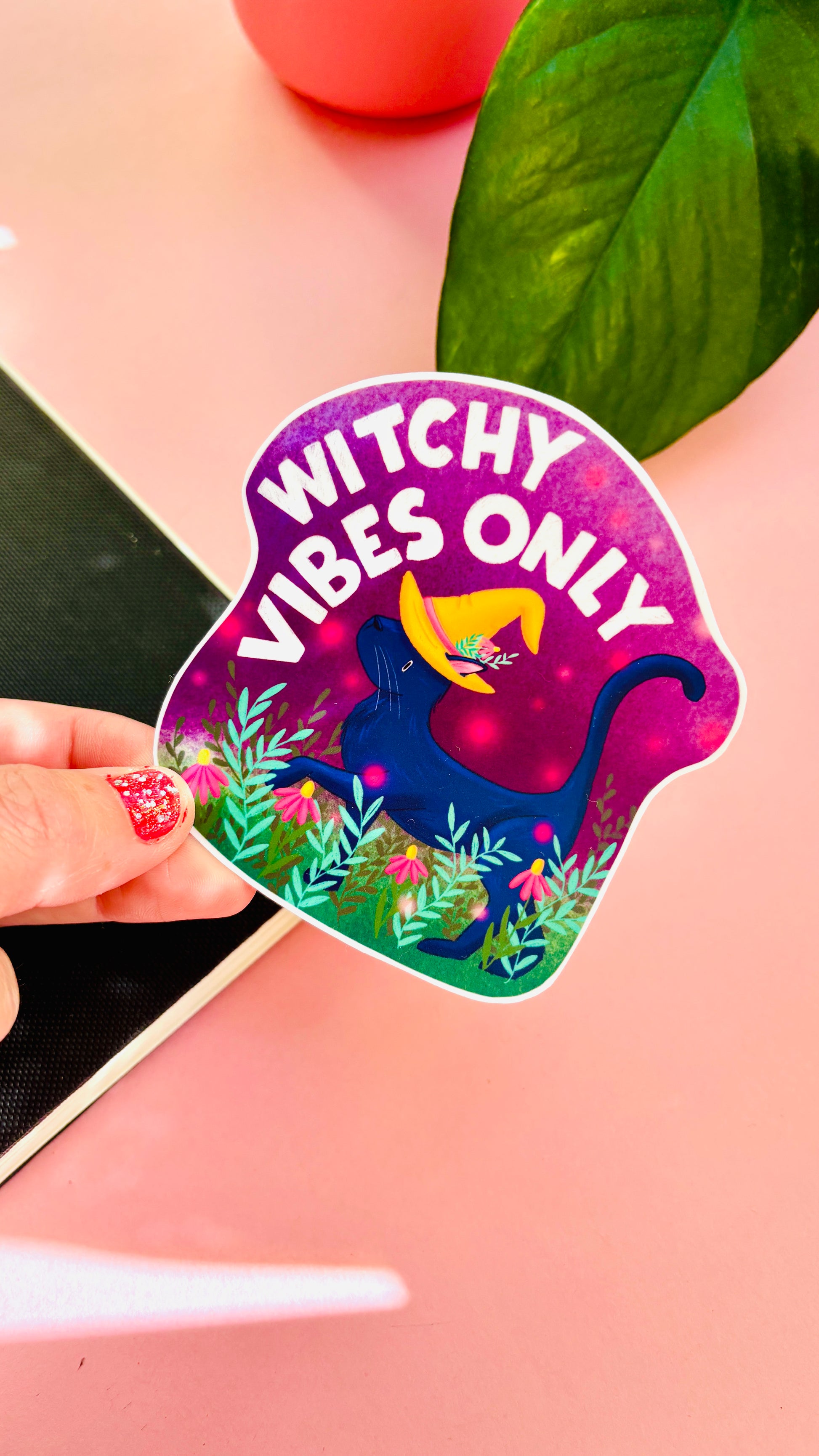 “Witchy Vibes Only” sticker – playful hand-drawn black cat, magical floral design, waterproof and suitable for journaling, scrapbooking, or Halloween décor.