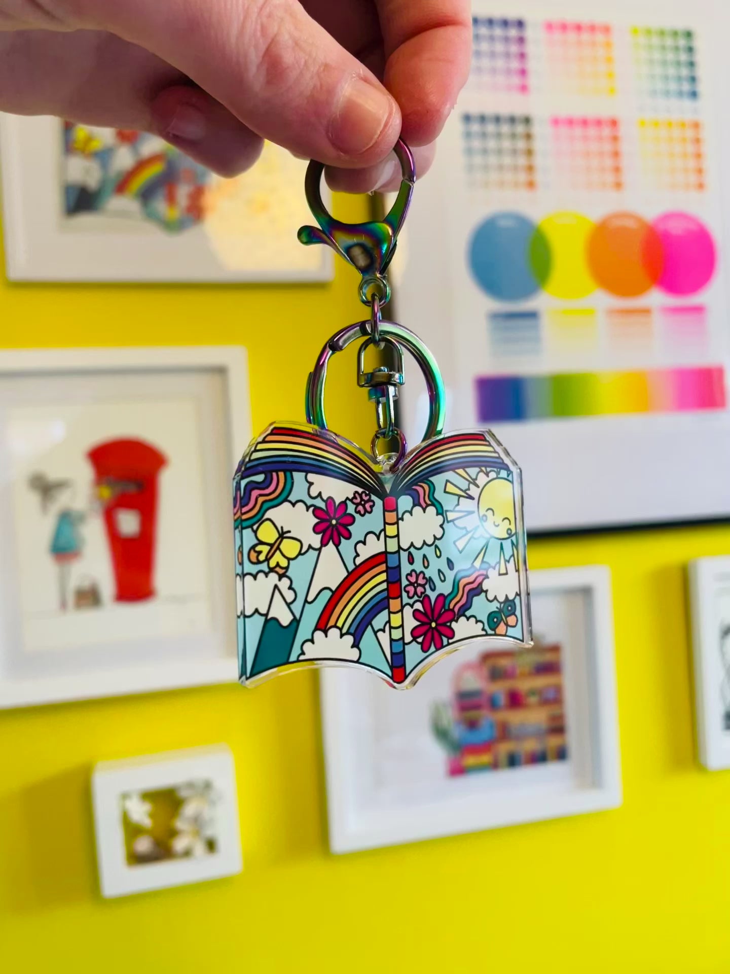 Colourful rainbow illustrated book keyring