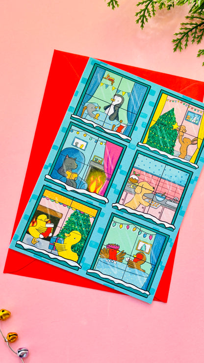 	Illustrated Christmas card designed like a festive building with animals in each window, including bunnies, penguins, a cat, a dog, robins, and ducks.