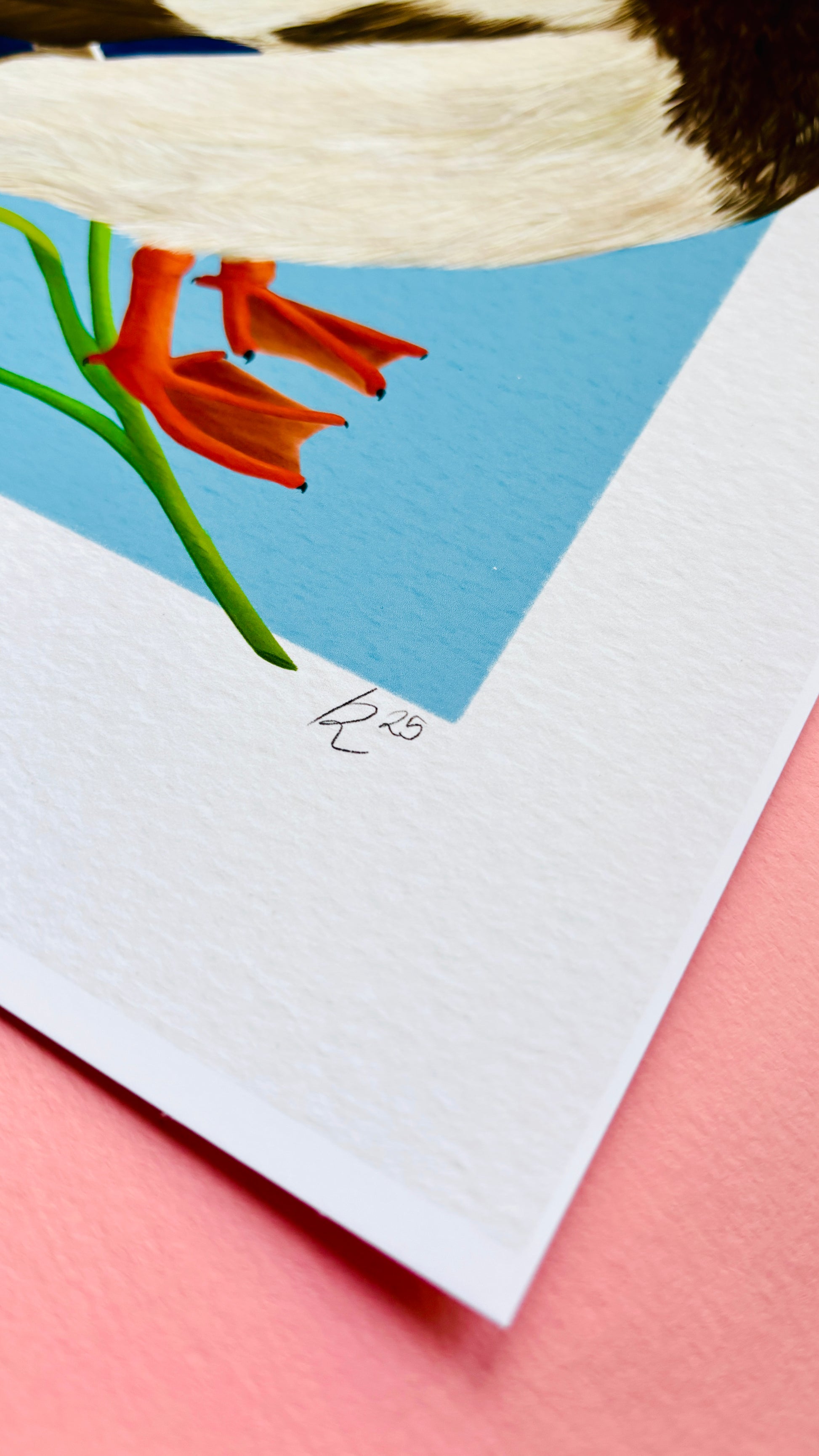 A detailed illustration of a mallard duck and vibrant yellow iris flower set against a vibrant blue background the duck art print is the perfect gift for nature lovers, fans of botanical art and cottagecore aesthetics.