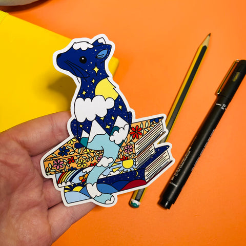 Starry cat and pile of books vinyl sticker 