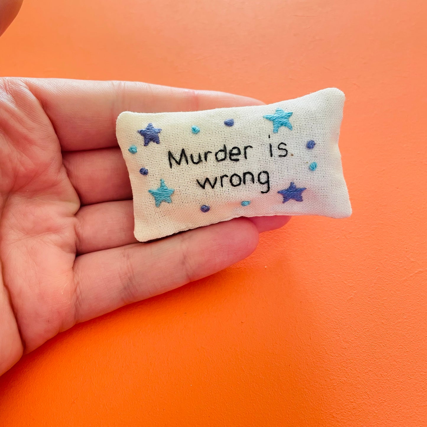 ‘Murder is wrong’ Pocket profanity- Flowers or Stars