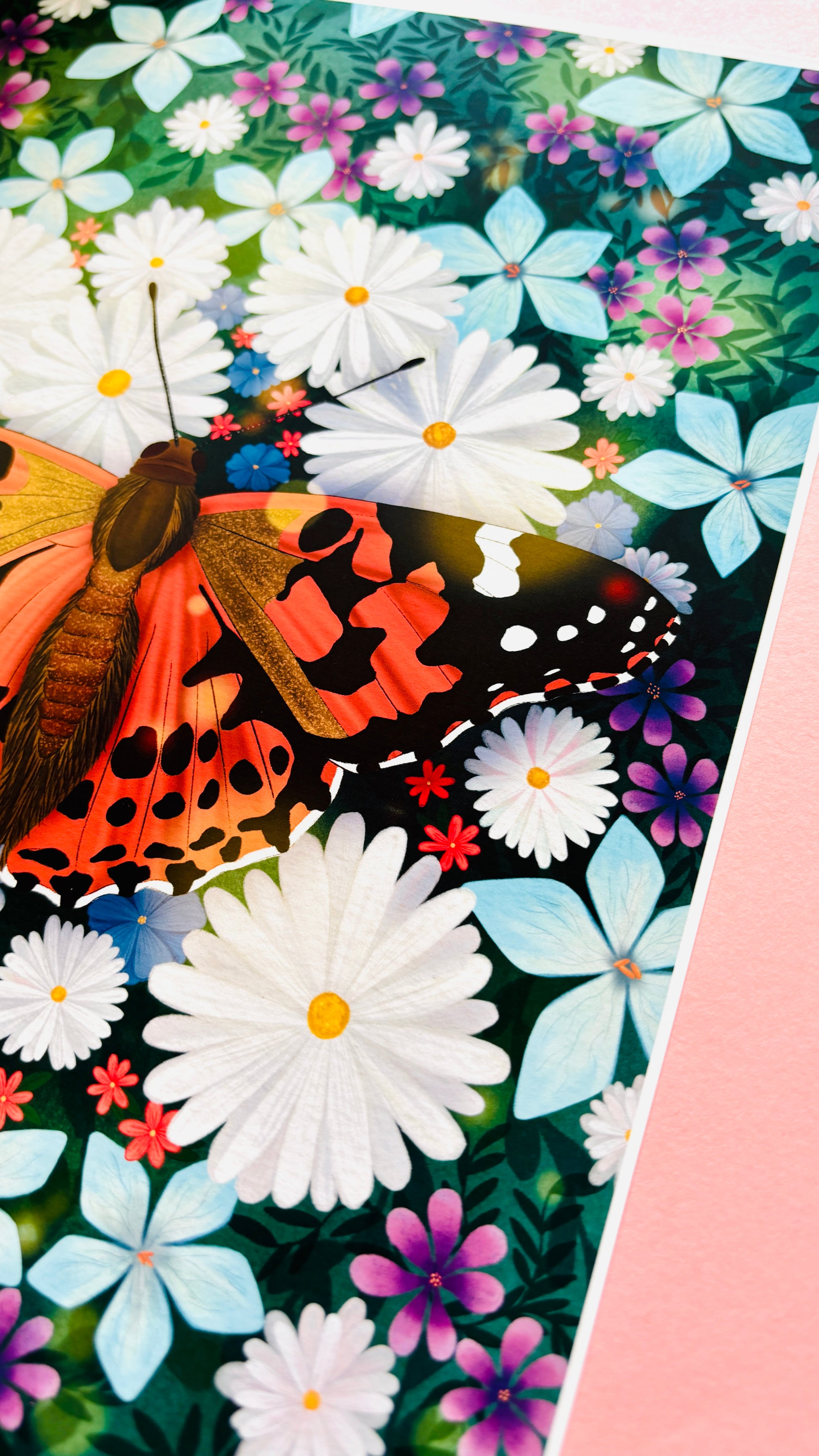 Colourful nature art print of a painted lady butterfly resting in a field of wildflowers. This beautiful illustration is perfect for lovers of nature, botanical illustration, wildflowers and cottagecore aesthetics. Illustrated and printed in the uk onto archival matte art paper and signed by the artist. 
