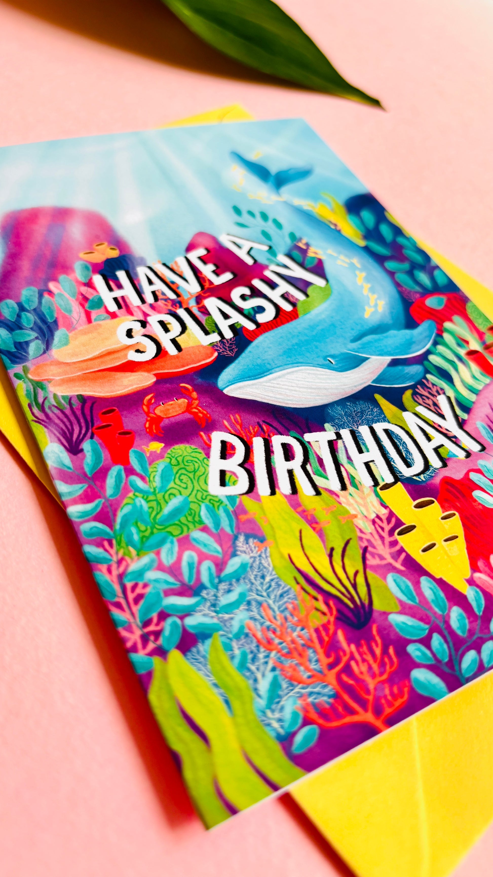 Whale handmade birthday card reads “have a splashy birthday” colourful coral reef and whale design. Handmade in the uk this card measures approximately a6, is blank inside for your message and is supplied with a cheerful yellow envelope 