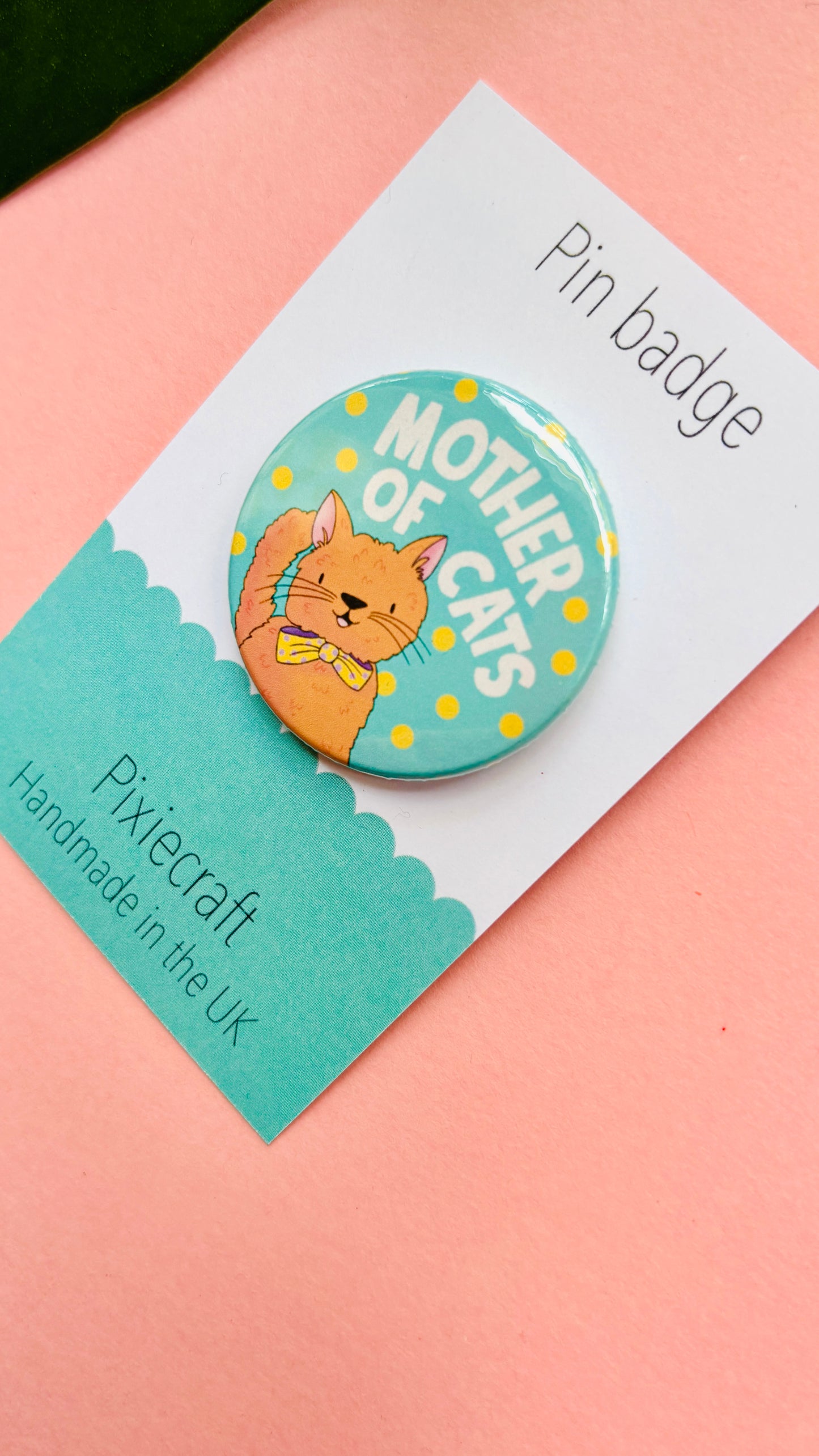 Handmade cat gift pin badge or fridge magnet. This cute accessory reads ‘mother of cats’ and you can choose from four different cat designs; brown tabby cat, orange/ginger cat, black cat, black and white cat. The hand drawn illustration is turned into a pin badge or magnet and presented on a colourful backing card ready for gifting. Great for stocking fillers.