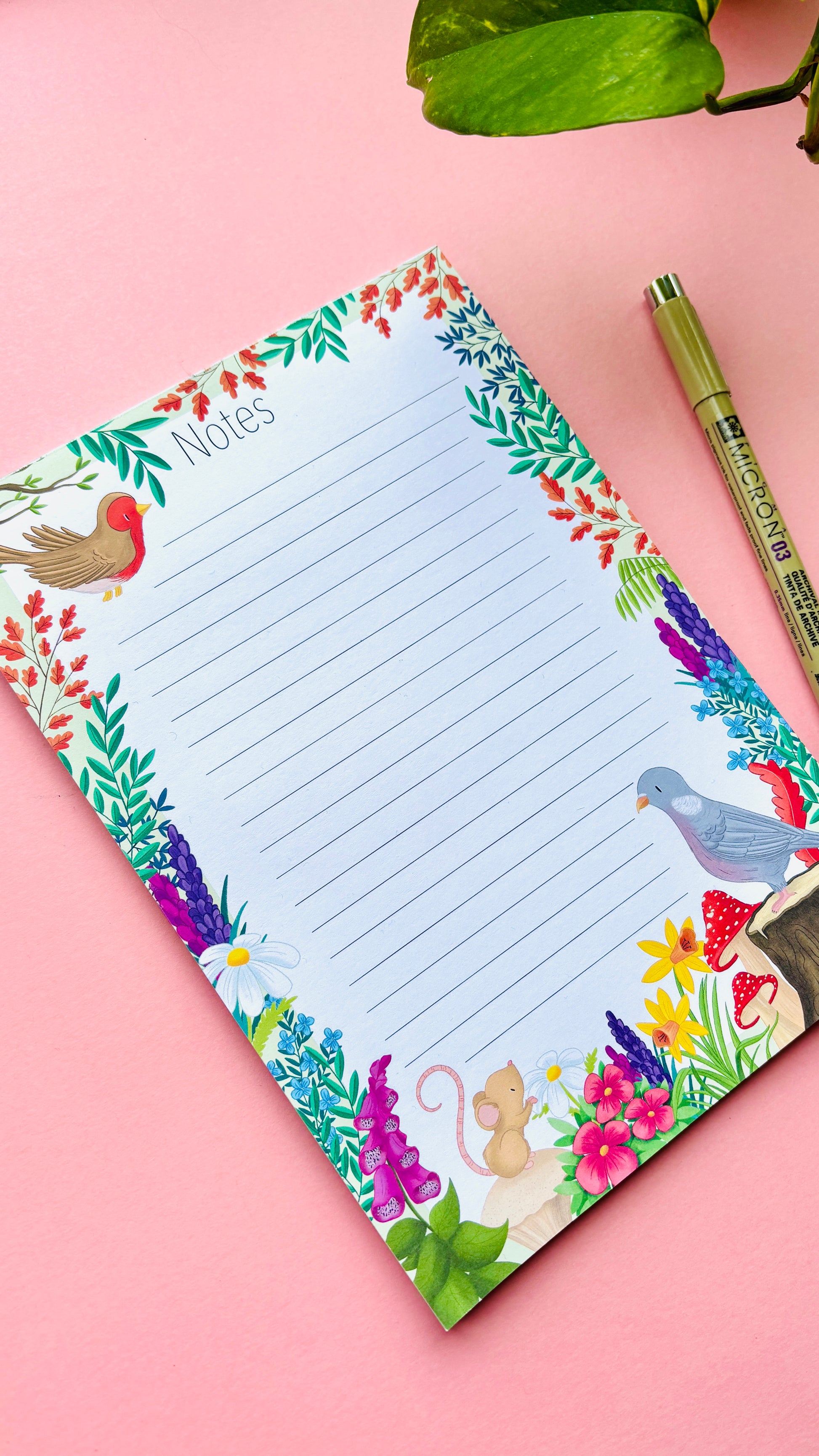 A5 woodland bird notepad with pigeon and robin illustration, lined pages and greyboard backing
