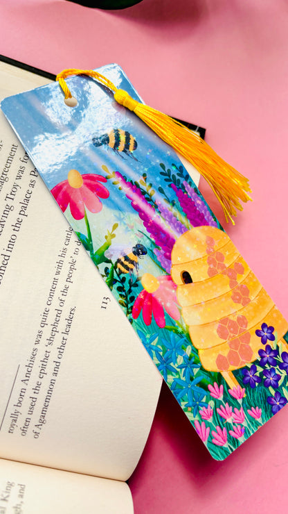 Rainbow holographic bee bookmark with whimsical wildflower meadow design, handmade in the UK, great for gifts, journals, and books.