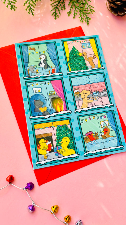 	Illustrated Christmas card designed like a festive building with animals in each window, including bunnies, penguins, a cat, a dog, robins, and ducks.