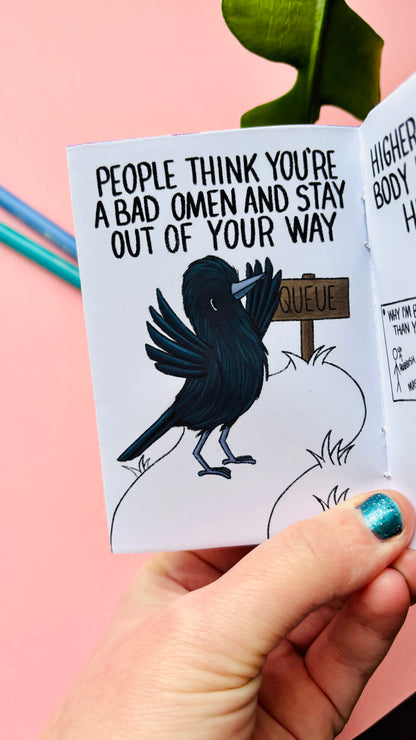 Illustrated crow zine photographed as a gift for bird lovers