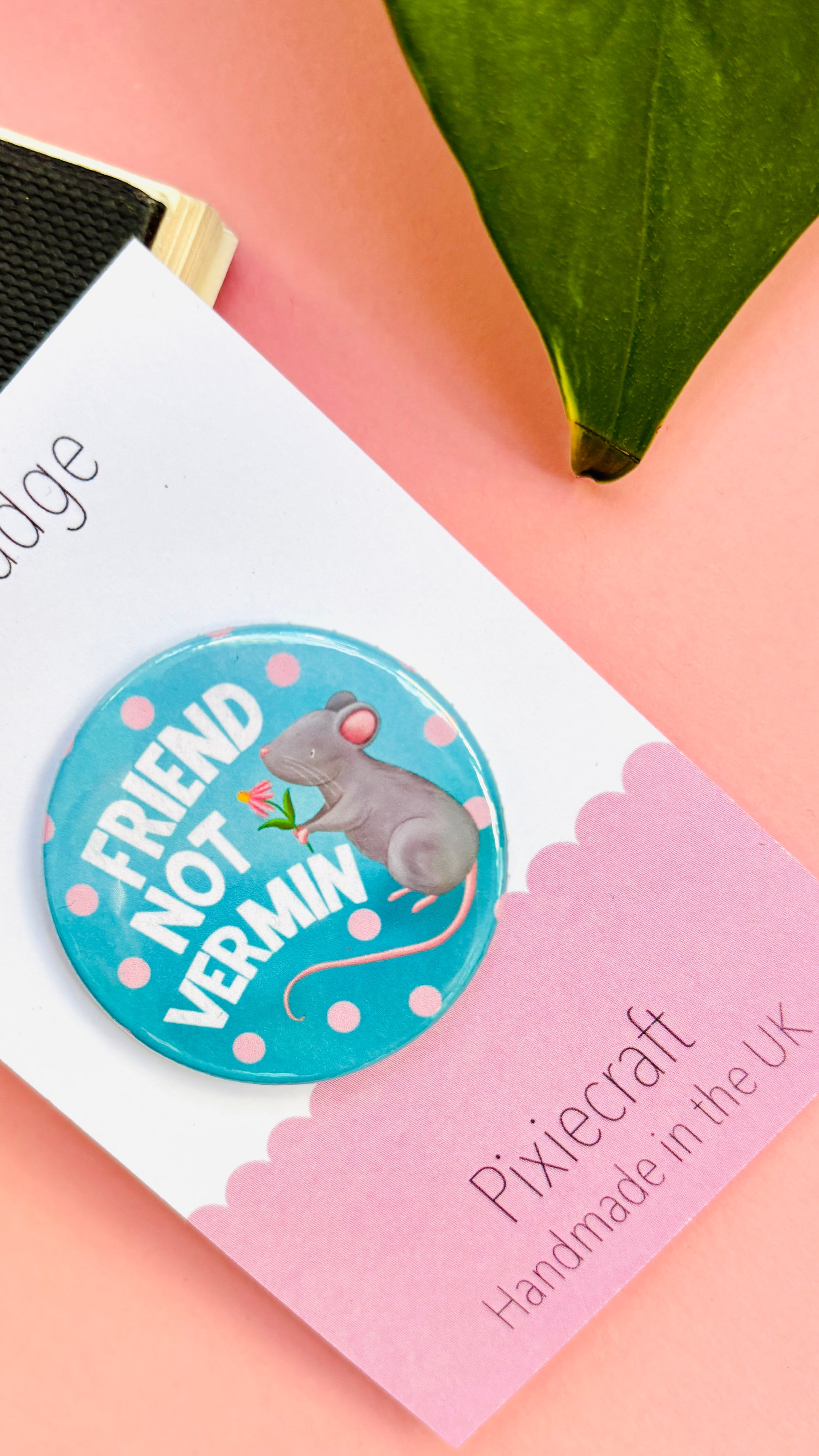 Cute rat holding a flower on a “Friend Not Vermin” badge or magnet, hand-illustrated and ideal for pets, small animal lovers, and quirky accessories.