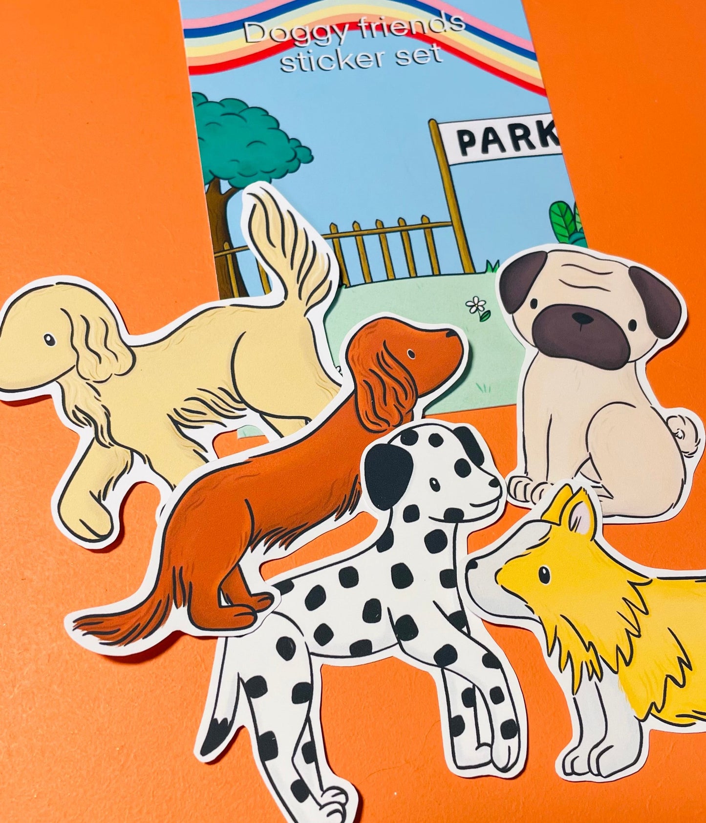 A cute set of five dog stickers with a colourful park themed backing card 