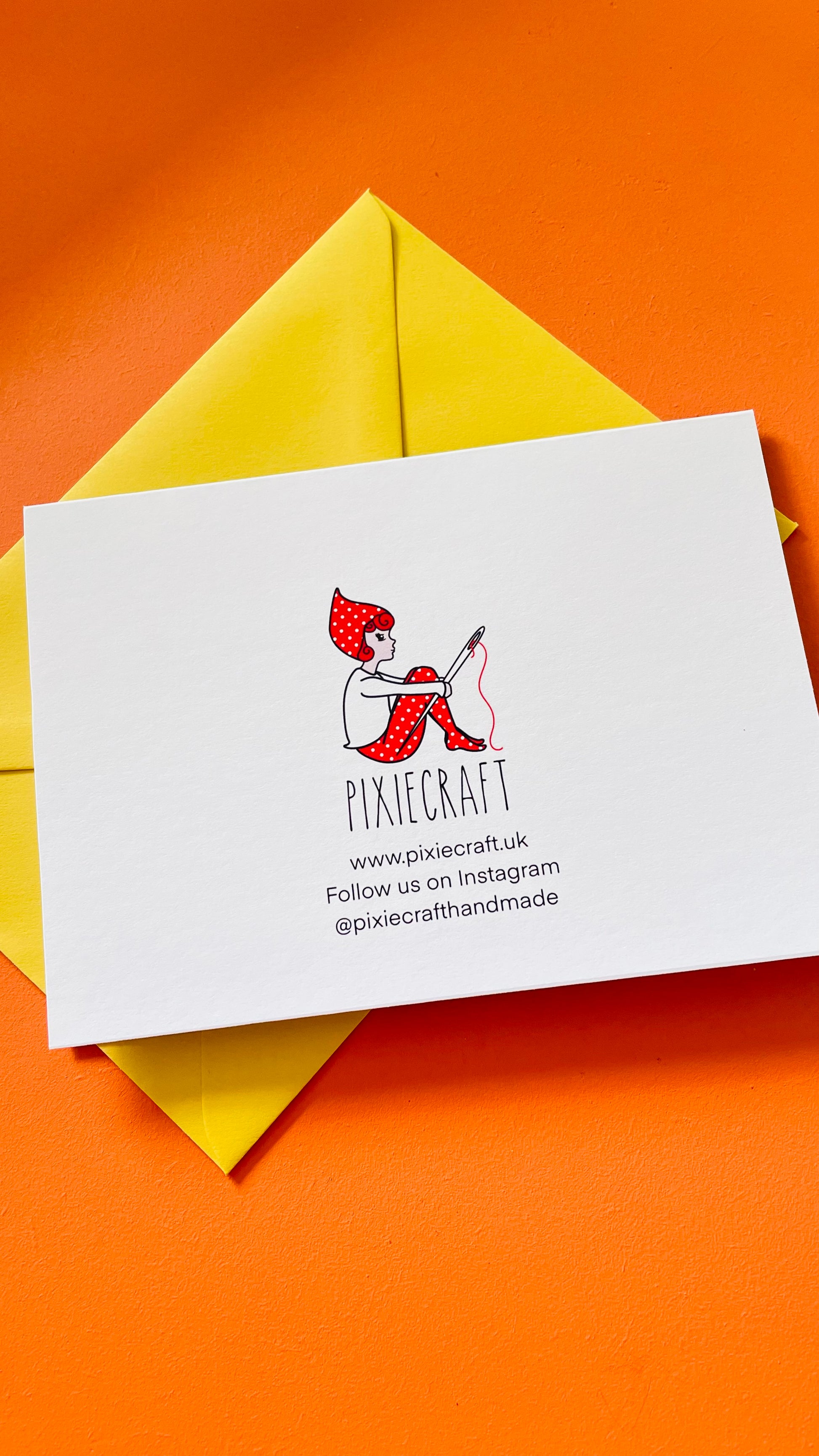 Reverse of card with Pixiecraft logo and website info