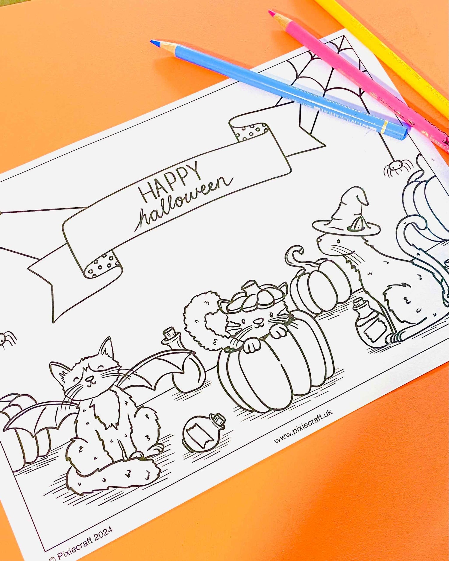 FREE Halloween cats illustrated colouring page