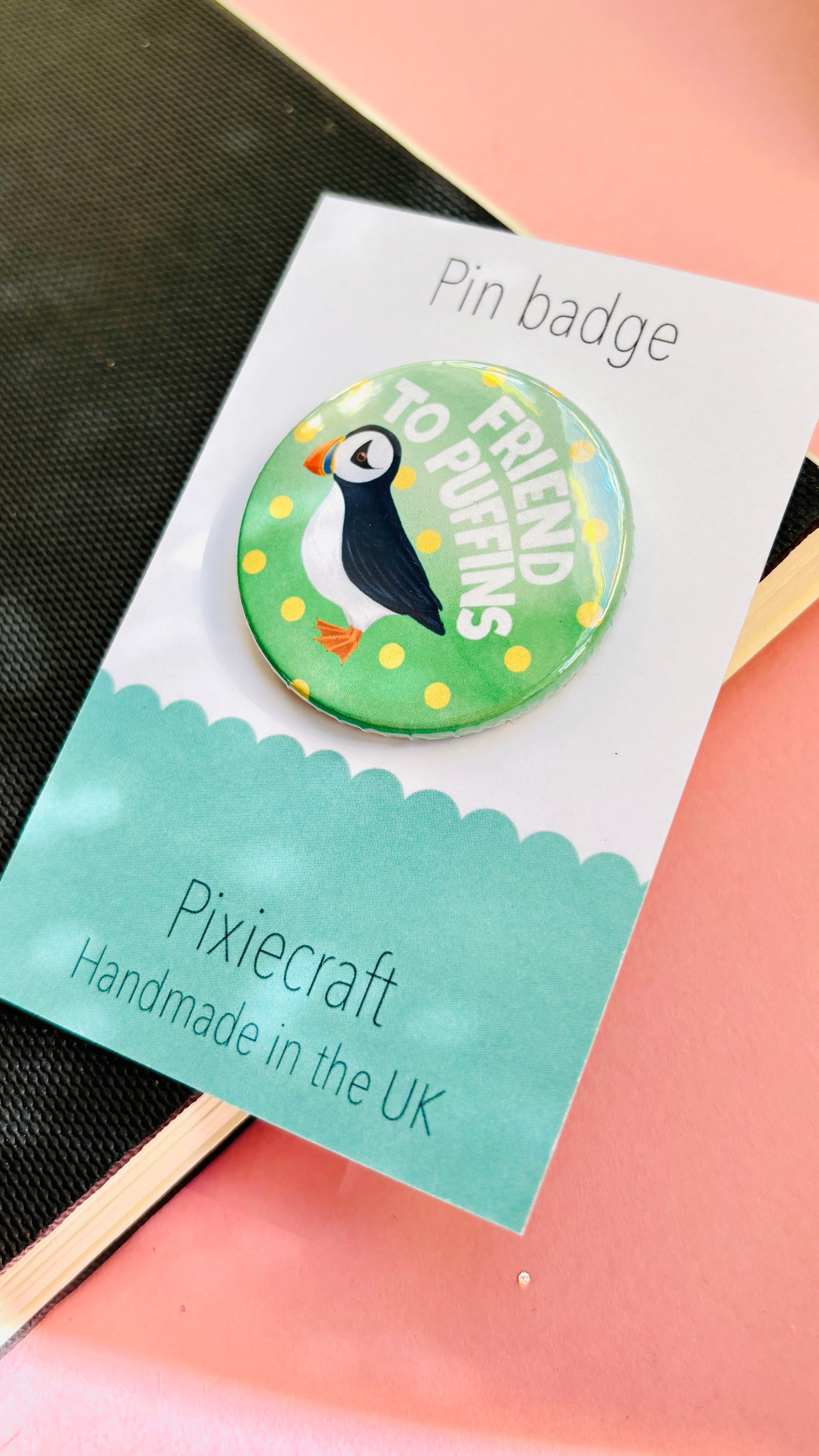 Cute puffin badge or magnet featuring a hand-drawn puffin design, available with magnet, plastic slide-on back, or safety pin.