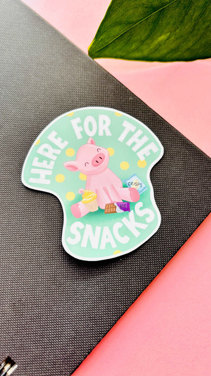 Handmade vinyl sticker of a pig with snacks and “Here for the Snacks” text – cute and waterproof for daily use. Sticker