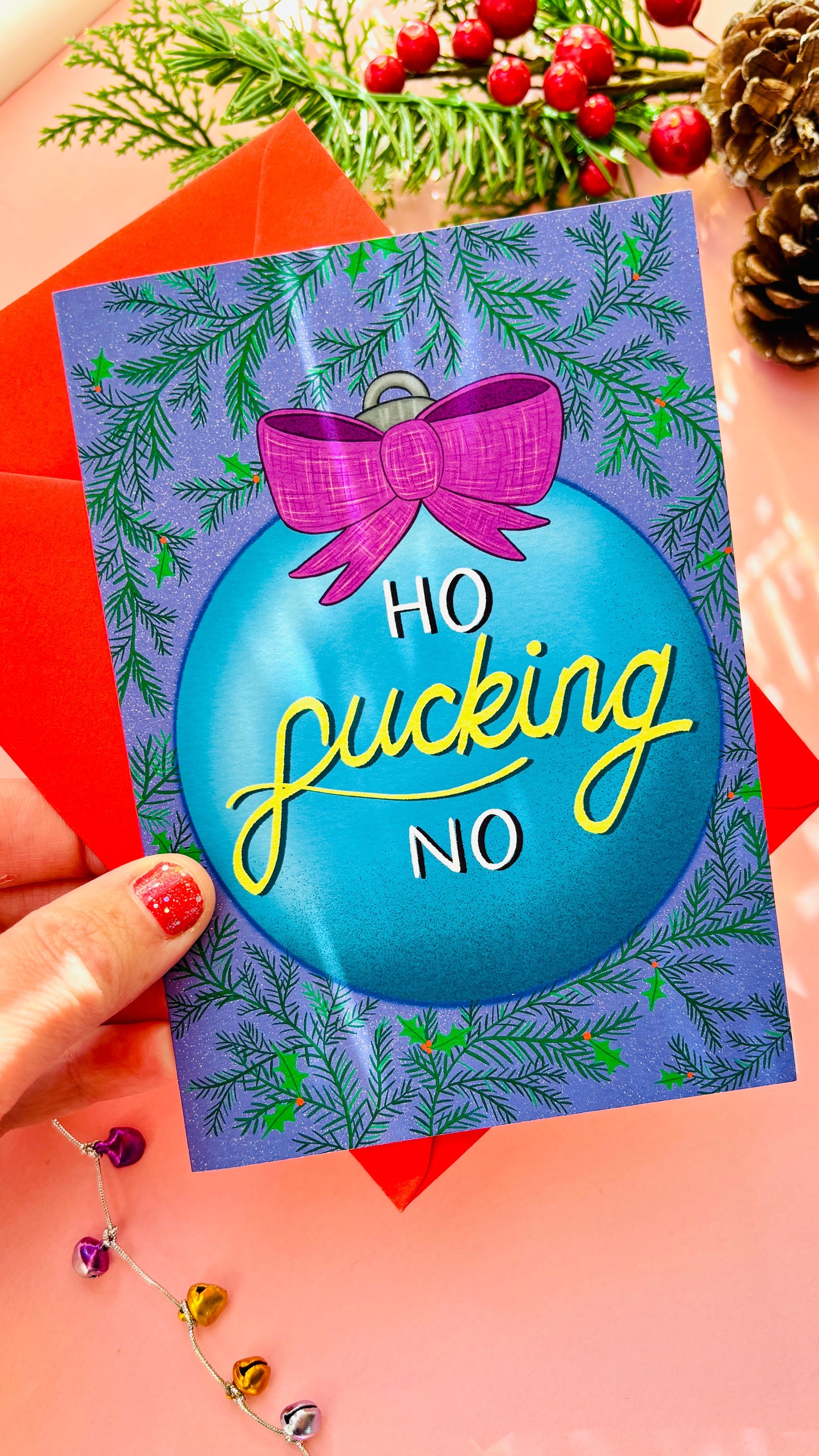 Sweary Christmas card featuring a blue bauble with “Ho Fucking No,” bold adult holiday greeting for friends and family.