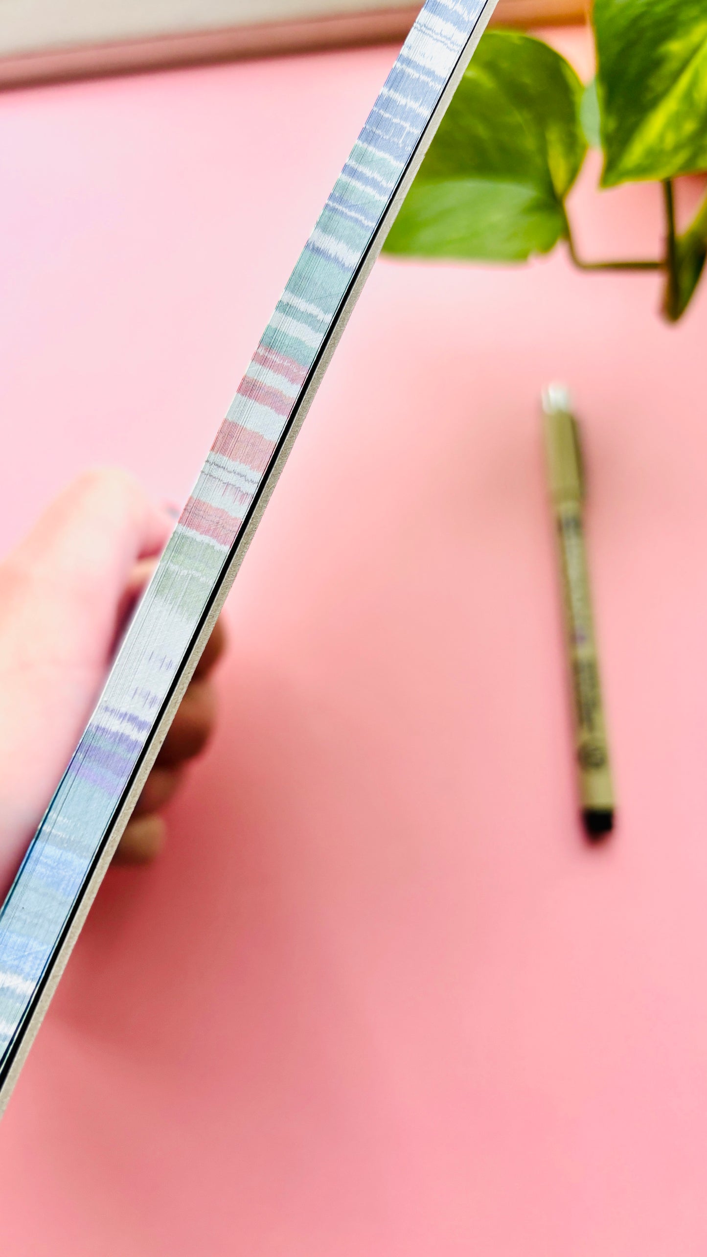 Side view of Cute indie A5 notepad featuring a woodland pigeon and robin design, nature inspired stationery