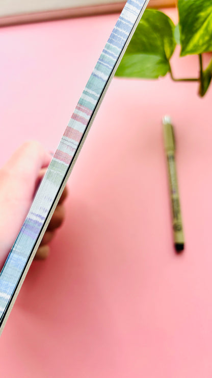 Side view of Cute indie A5 notepad featuring a woodland pigeon and robin design, nature inspired stationery