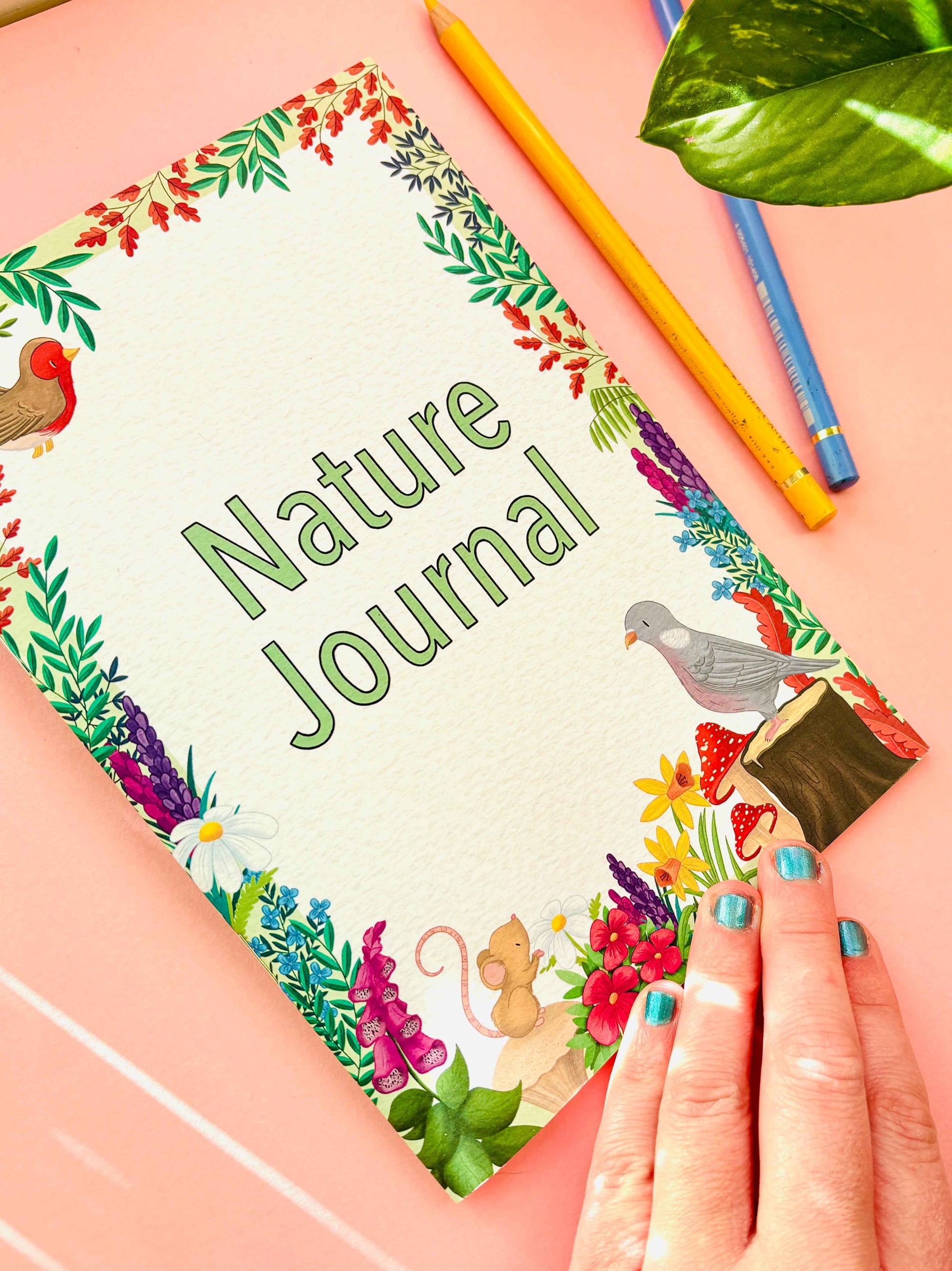 A5 nature observation journal laid flat, illustrated nature notebook with rounded corners