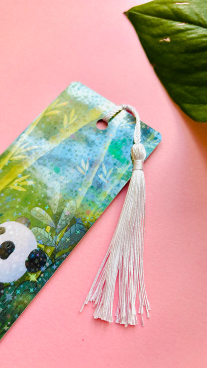 Panda holographic bookmark displayed with books and stationery – cute panda gift for readers.