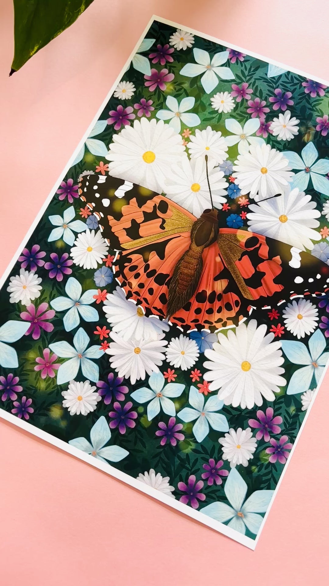 Colourful nature art print of a painted lady butterfly resting in a field of wildflowers. This beautiful illustration is perfect for lovers of nature, botanical illustration, wildflowers and cottagecore aesthetics. Illustrated and printed in the uk onto archival matte art paper and signed by the artist. 