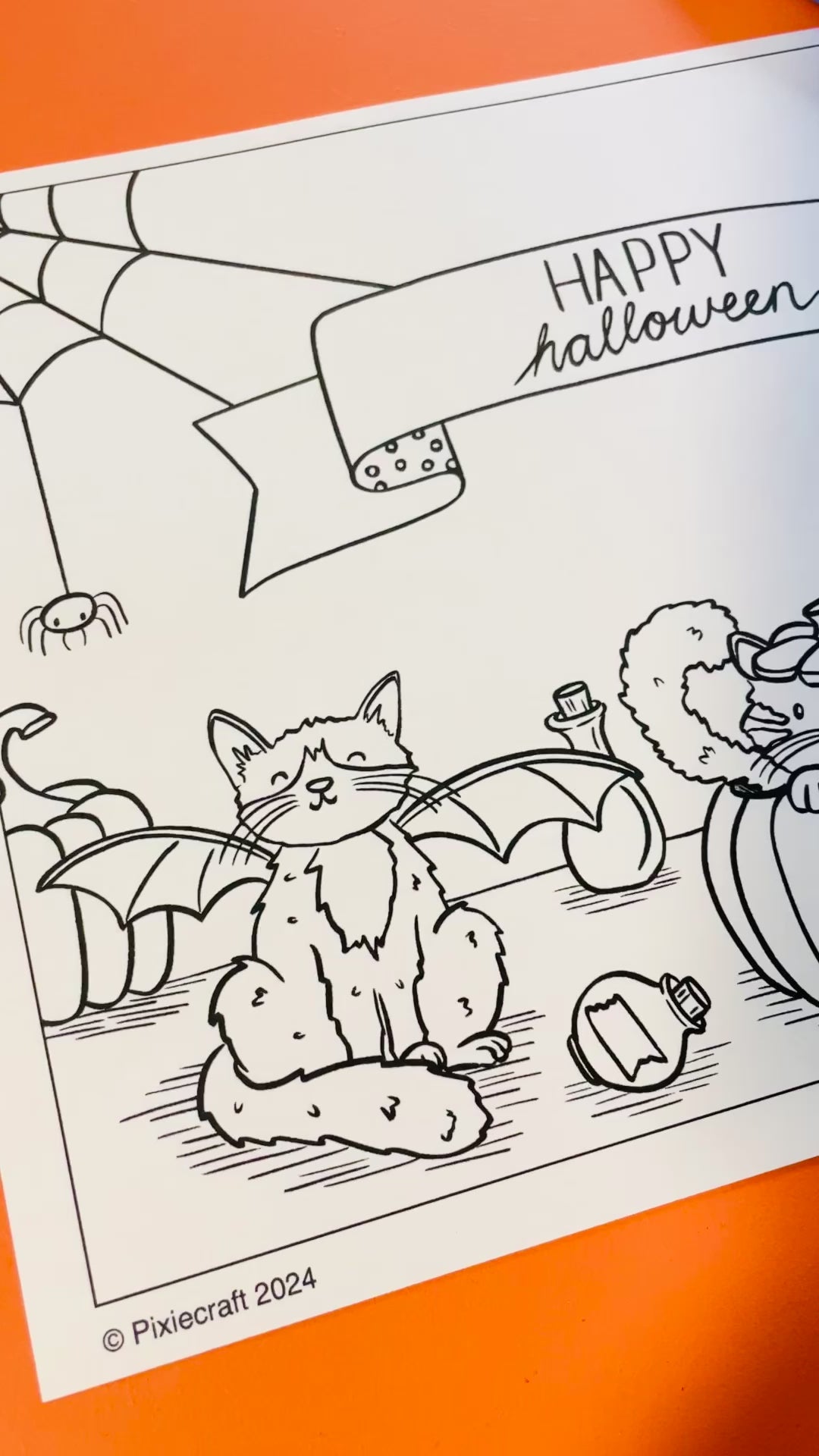 Halloween cats illustrated free colouring page