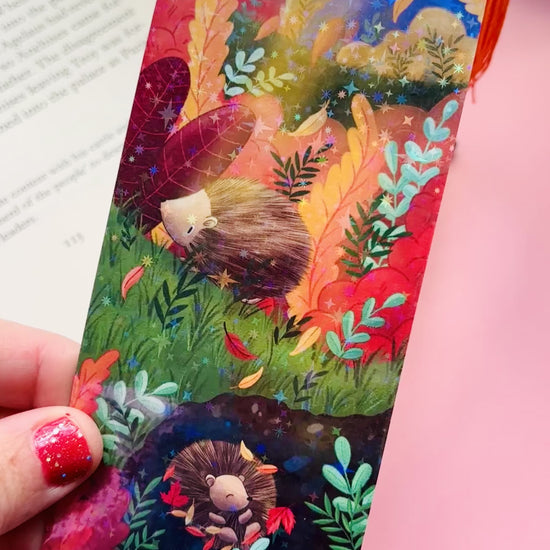 Cute hedgehog holographic bookmark – whimsical autumn design, perfect for book lovers and stationery enthusiasts.