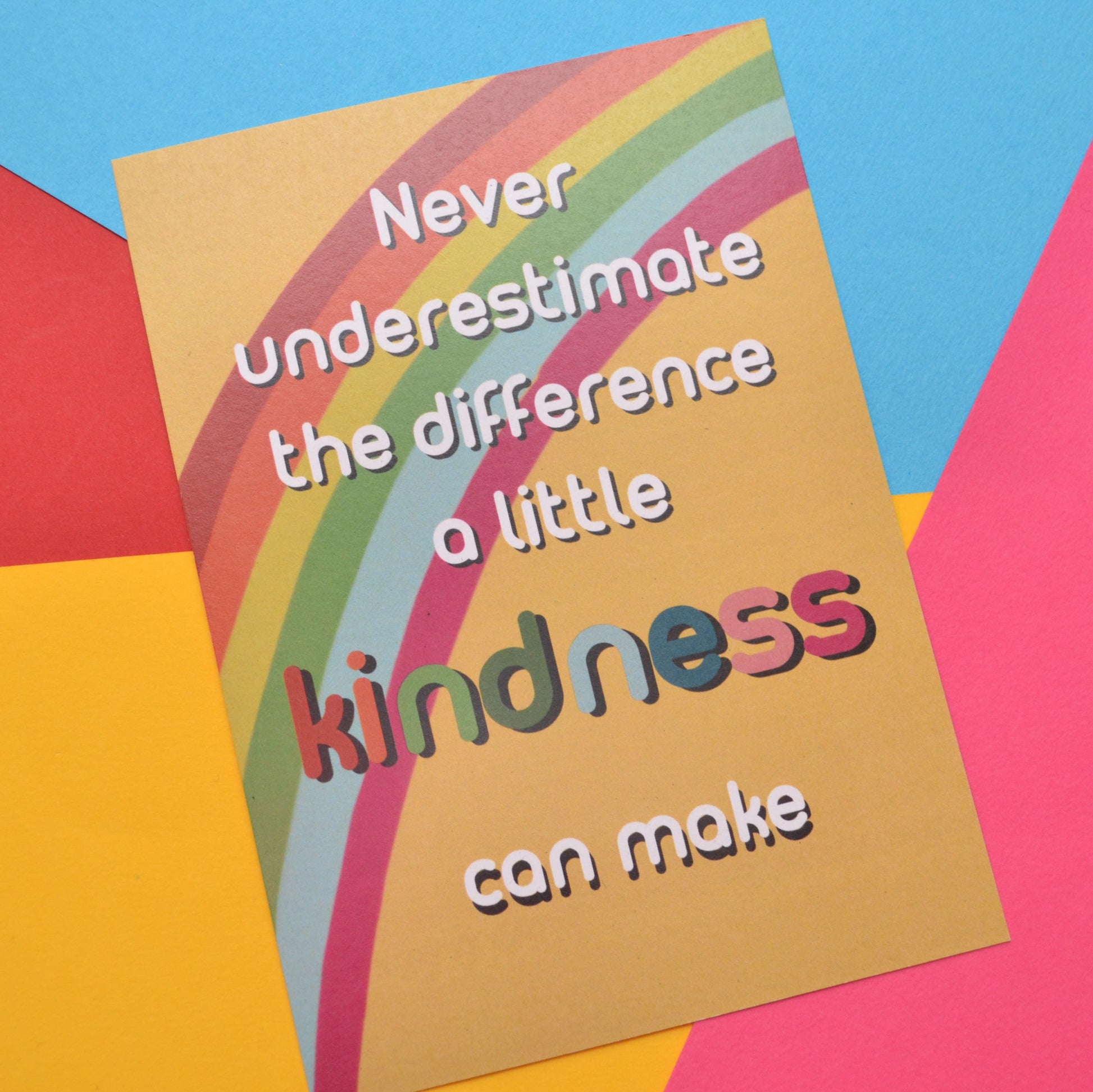 Never underestimate the difference a little kindness can make postcard on a yellow and rainbow background